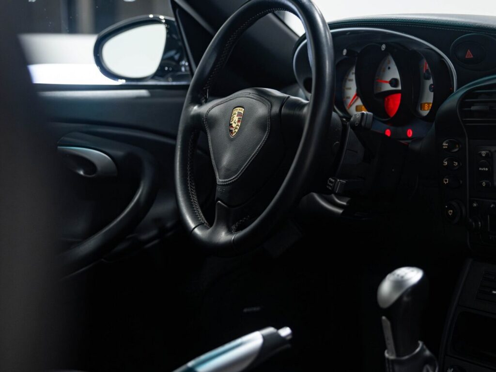 Interior cockpit of a 2003 Porsche 911 Turbo with a six-speed manual